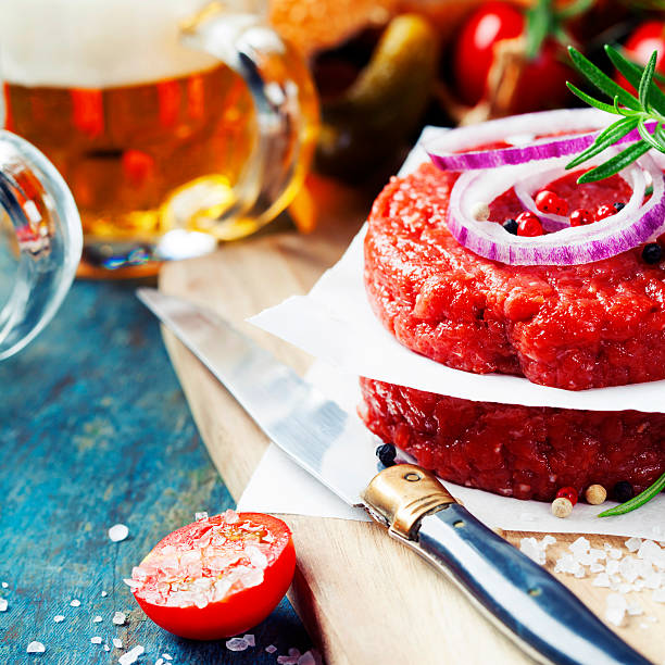 Beer and Raw Ground beef meat Burger steak cutlets