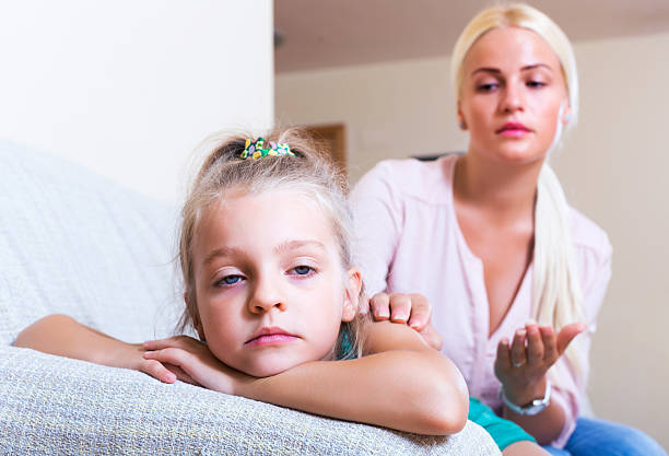 istock Nanny calming a fretful child 521978272