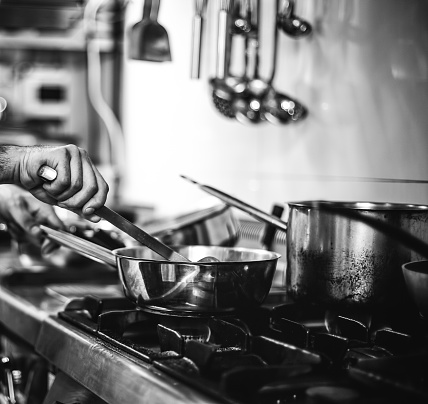 Chef working in a kitchen - Black and white image