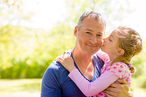 istock Little girl enjoying with her father 521985262