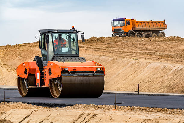 New road construction Road roller building the new asphalt road compactor photos stock pictures, royalty-free photos & images
