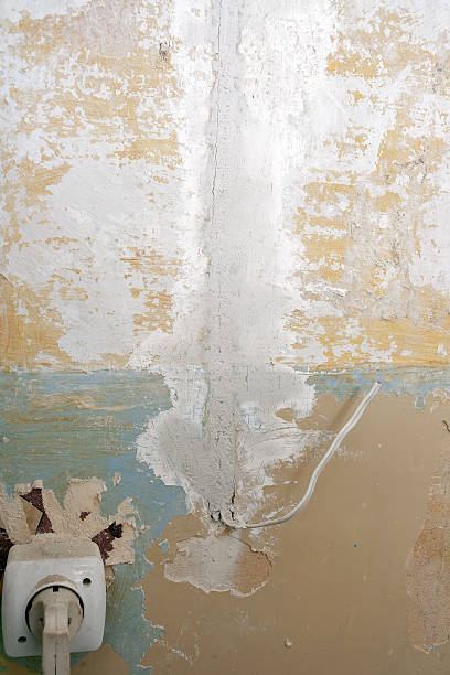 istock Immurement electric wires in the wall 521985556