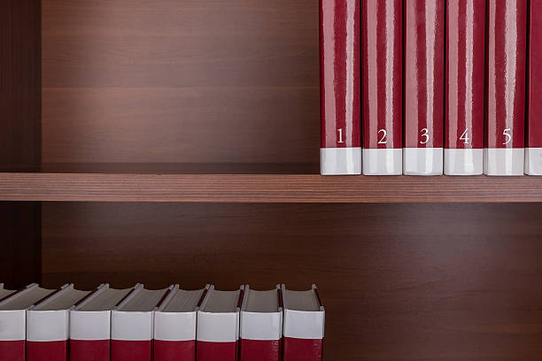 istock Old books on a wooden shelf. 521986752