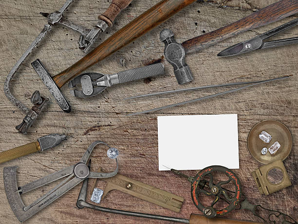 istock vintage jeweler tools over wooden bench 521987430