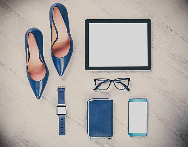istock business woman outfit with comunication gadgets 521988242