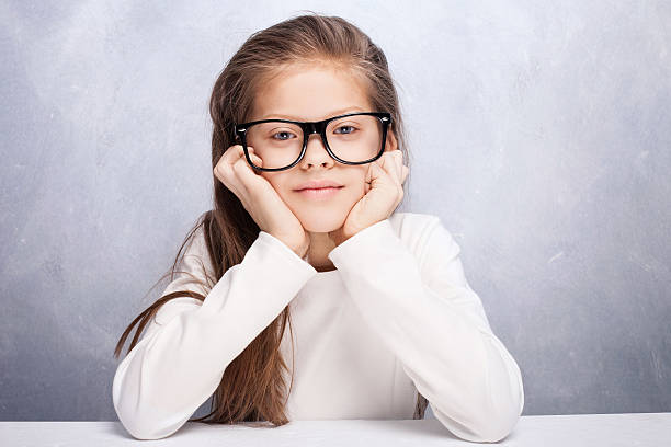 istock Cute young girl posing in studio. 521989834