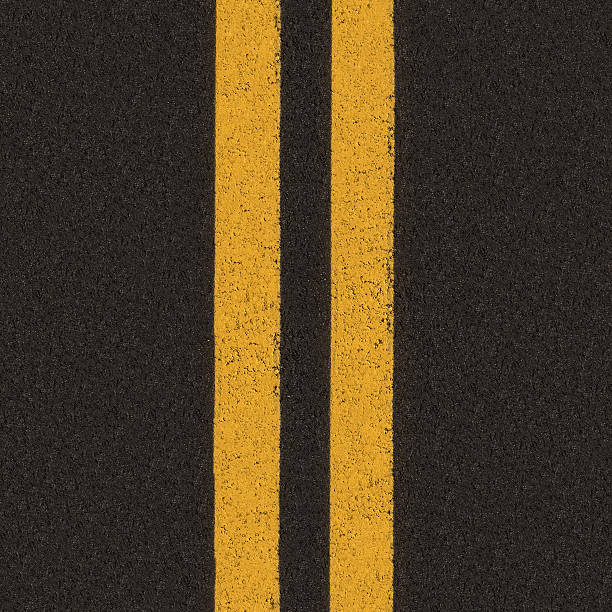 istock Asphalt highway with yellow road lines background 521990188
