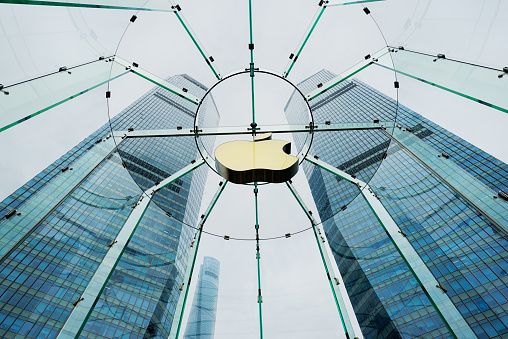 Shanghai, Сhina - August 30, 2015: Apple's flagship store in Lujiazui, Shanghai  China. Modern office building in the background. 