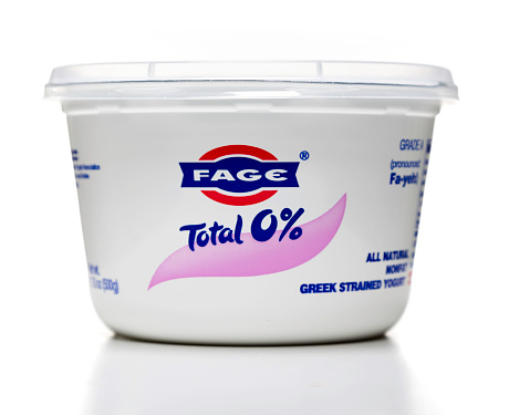 Miami, USA - March 30, 2016: Fage greek strained yogurt jar. Fage brand is owned by FAGE LUXEMBOURG S.A R.L.