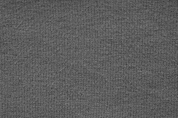 istock texture from a soft knitted fabric of black color 521992323