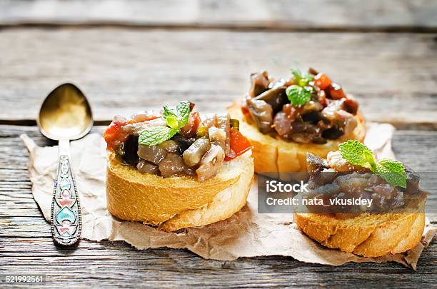 Bruschetta With Roasted Eggplant And Tomatoes Stock Photo - Download Image Now - Autumn, Bread, Breakfast