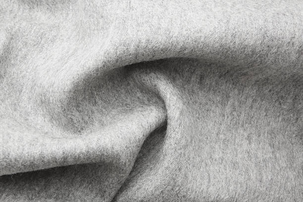warme graue wolle winter schal nahaufnahme - cashmere texture stock-fotos und bilder