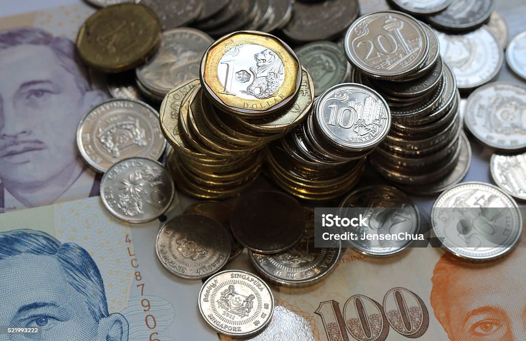 Singapore currency 19 April 2016, Singapore. Picture shows a few stacks of the country commonly used coins and notes in random placement.  All Asian Currencies Stock Photo