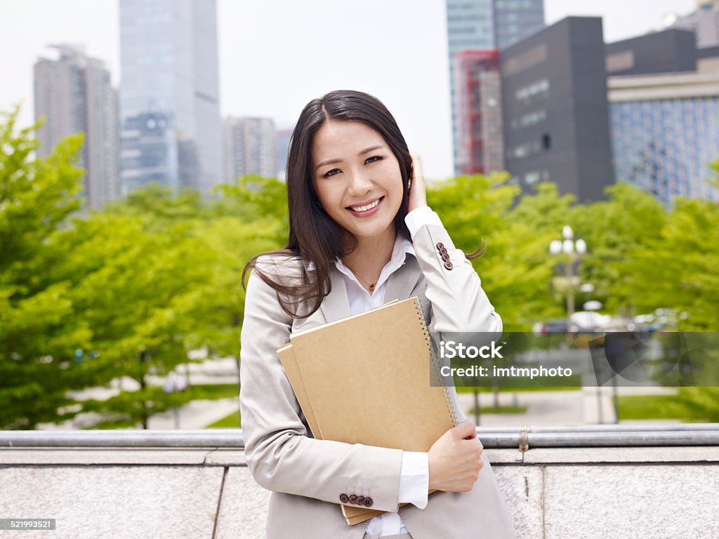 asian office lady outdoor portrait of an asian businesswoman. Adult Stock Photo