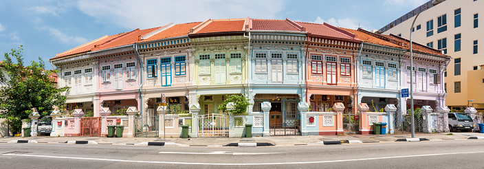 Row of conservation shophouses along Koon Seng Road near Joo Chiat in Singapore. The image was taken early afternoon.