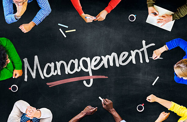 istock Group of Multiethnic People Discussing about Management 521994369