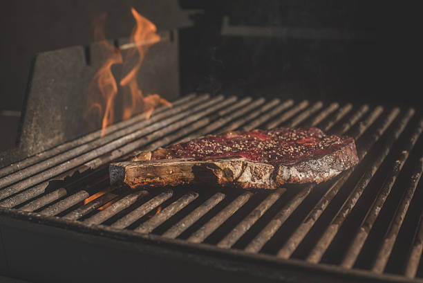 istock BBQ Steak on Grill Gourmet Flame Porterhouse Dry Aged 521994534