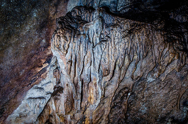 istock spelunking,caving,pot holing,speleology,exploration. colour image, 521994847