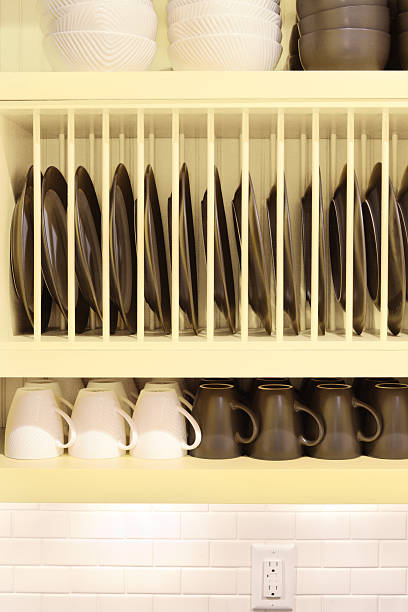 istock Open Kitchen Cabinet Design with dish rack and shelves 521995335