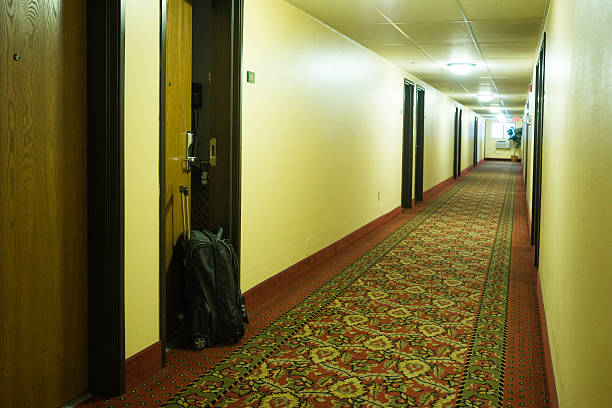 istock Empty hallway of a contemporary clean hotel 521995640