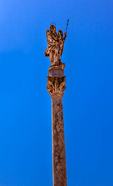istock Triumph 0f Archaangel San Raphael Statue Column Cordoba Spain 521996762