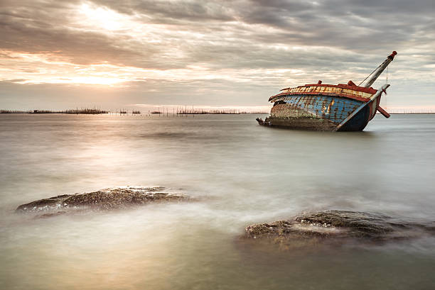 Ghost Ship Ghost Ship, Angsila Beach Thailand ghost ship stock pictures, royalty-free photos & images