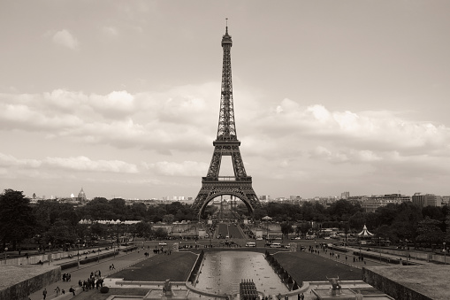 this view in black and white shows the Eiffel tower. You can see an old Haussmann building too. 