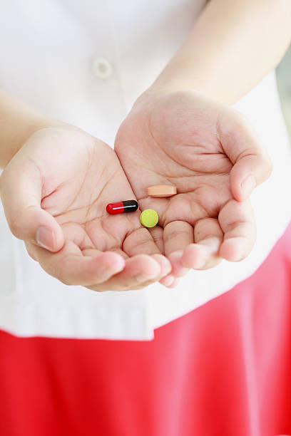 istock Pills medicine tablets in doctor hand 521999050
