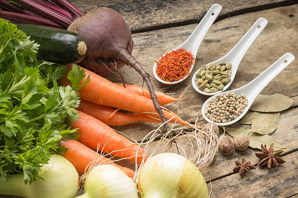 istock Various Spices and Vegetables on wood background. Restaurant menu background 521999059