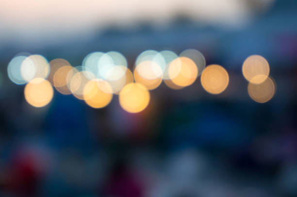 Abstract of a string of twinkling lights Abstract of a string of twinkling lights in the distance def picture photos stock pictures, royalty-free photos & images