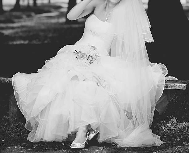 istock Bride plays around with her dress 521999649