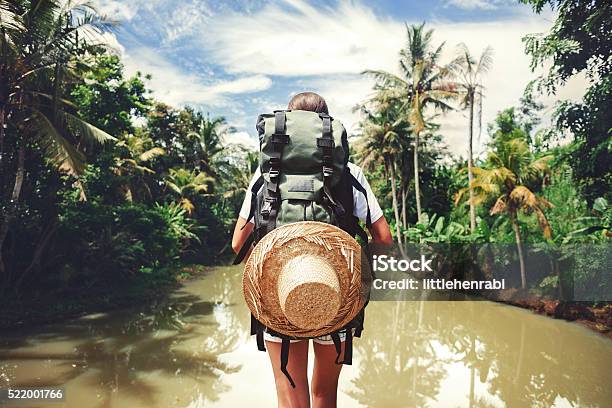 Woman Standing Near Big Tropical River Stock Photo - Download Image Now - Travel, Journey, Backpack