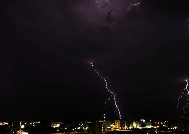 istock Thunder storm at night in the city 522003432