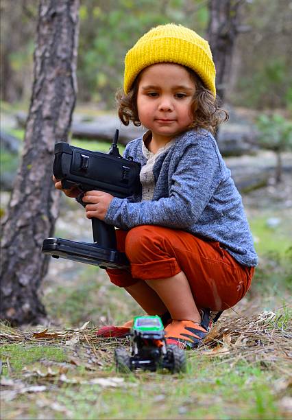 istock Child With Remote Control Truck 522003598
