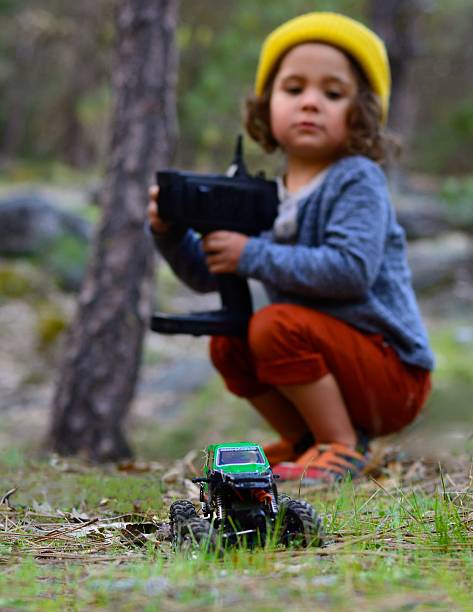 Child With Remote Control Truck - defocused