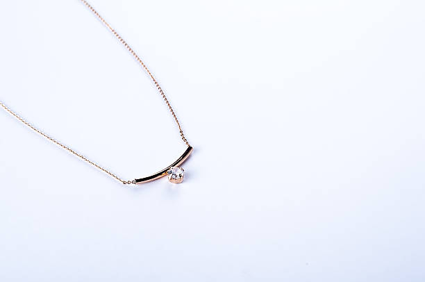 istock gold necklace with a stone 522004566