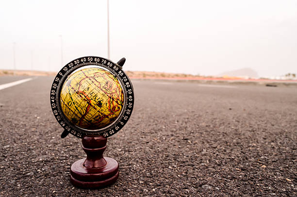 istock Globe Earth on an Asphalt Street 522007570