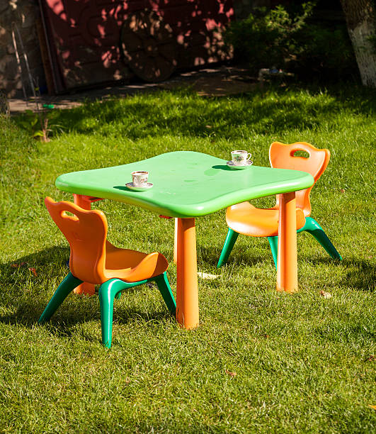 istock toy plastic chair and table on grass at yard 522014927