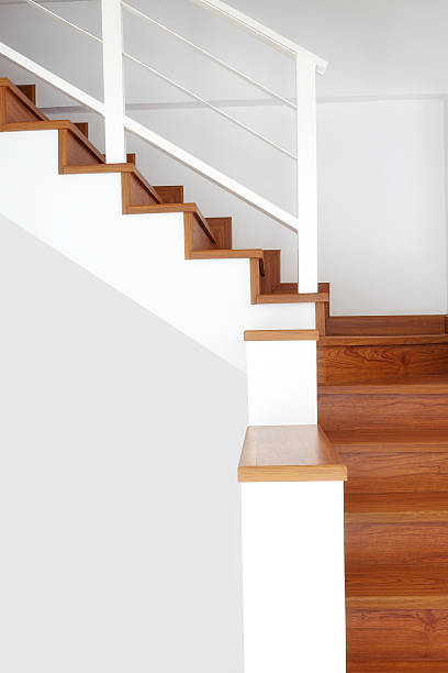 istock Interior - wood stairs and handrail 522015605