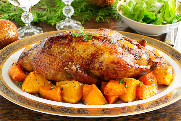 istock Roast duck with pumpkin and oranges. 522020573
