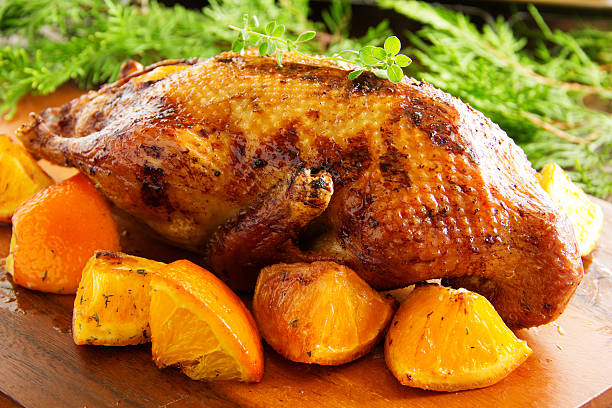 istock Roast duck with pumpkin and oranges. 522022723