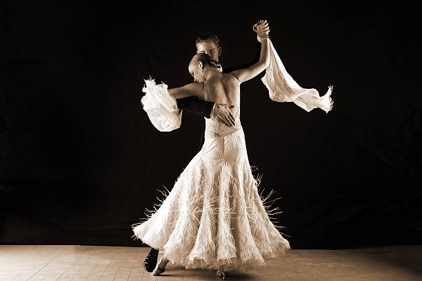 istock dancers in ballroom against on black 522031833