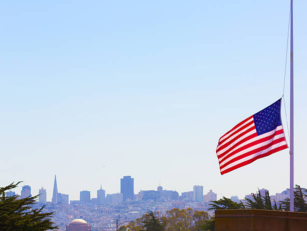 San francisco fog skyline with fishing rod in california San francisco foggy with United States flag foreground California frisco texas stock pictures, royalty-free photos & images