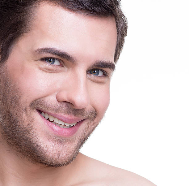 istock Portrait of handsome smiling young man. 522034377
