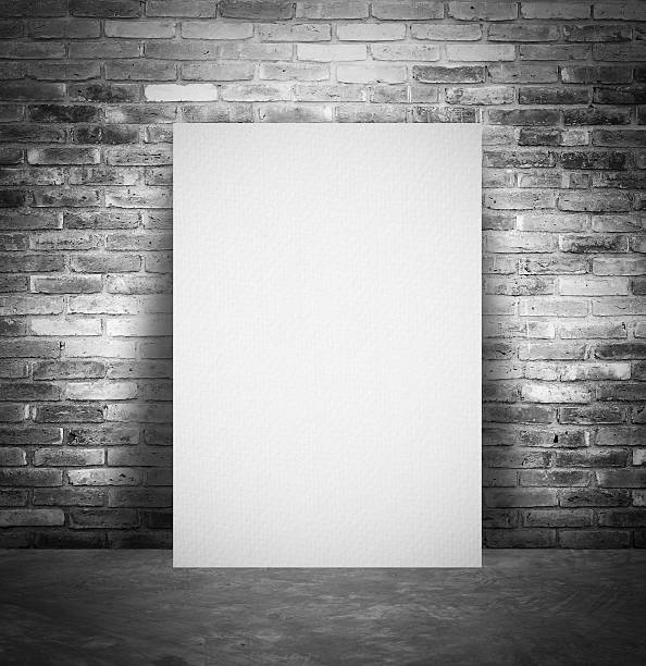 istock Blank paper poster and brick wall background 522034673