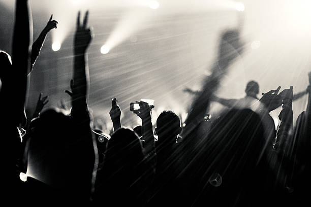 istock Group of people enjoying a concert 522035185