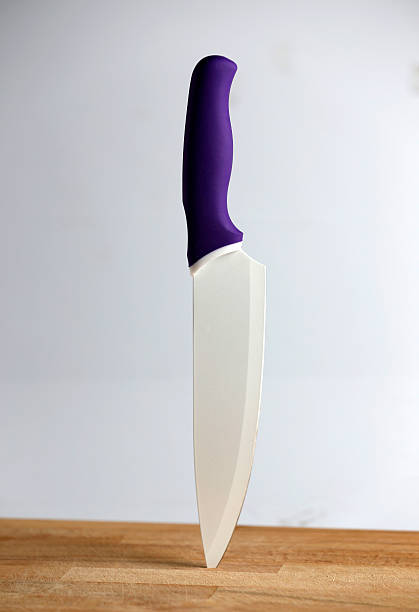istock Kitchen Knife on a Wooden Cutting Board 522036739