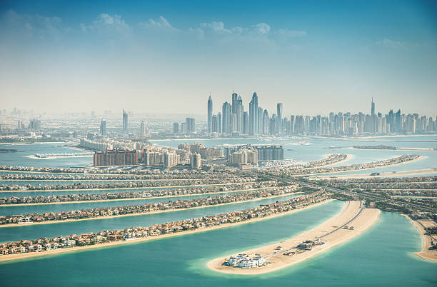 istock the palm jumeirah in Dubai with skyline 522037279