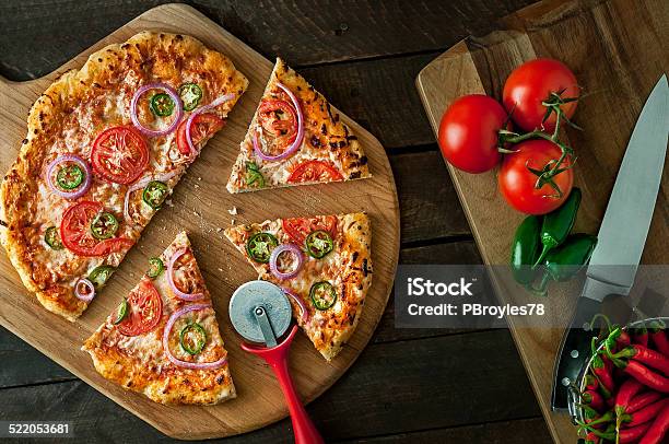 Pizza On Peel With Ingredients Stock Photo - Download Image Now - Cheese, Cutting Board, Dinner