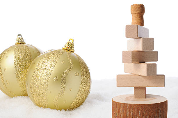 istock Wood blocks Christmas tree with Christmas ball on snow 522054655